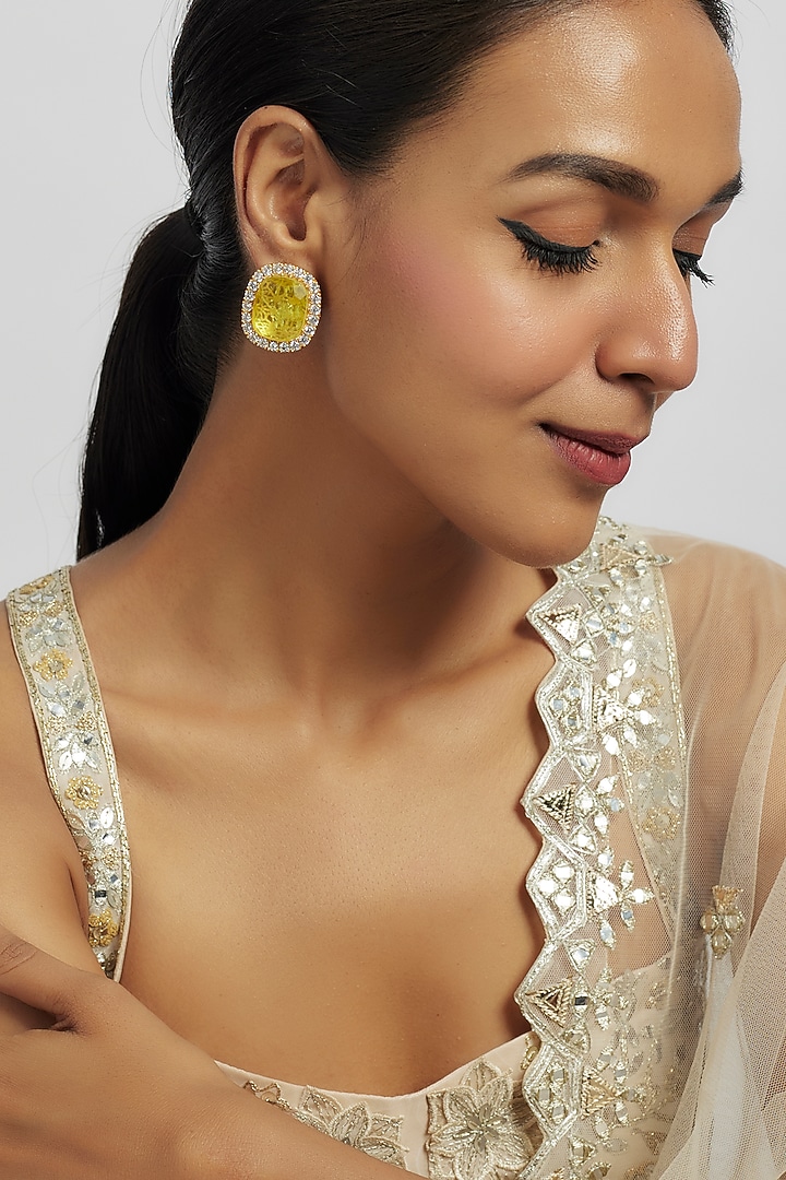 Gold Finish Yellow Zircon Stud Earrings by Moh-Maya by Disha Khatri at Pernia's Pop Up Shop